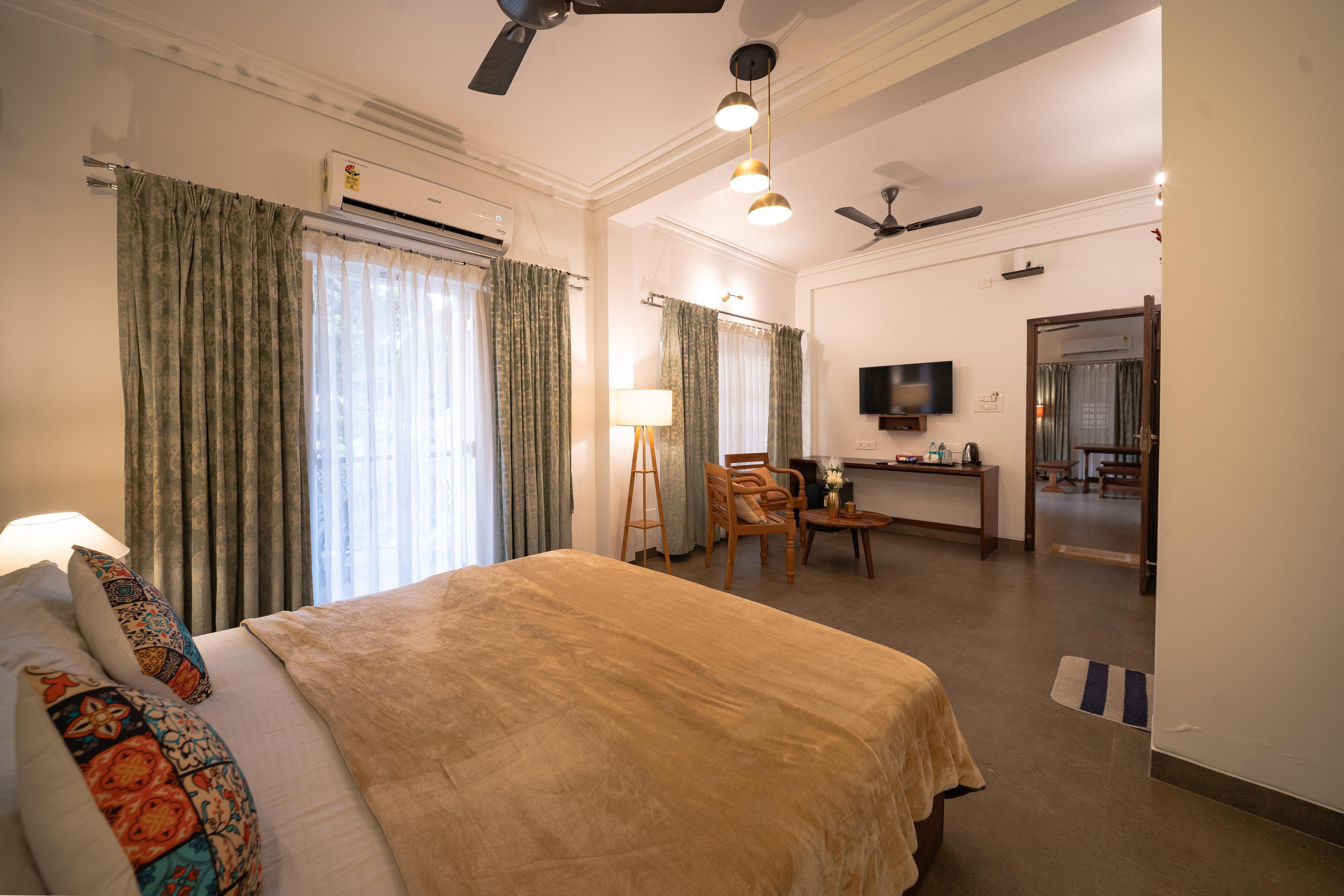 Elegant Holiday Homes | 2 BHK Villa & Rooms - Tap to explore photos
