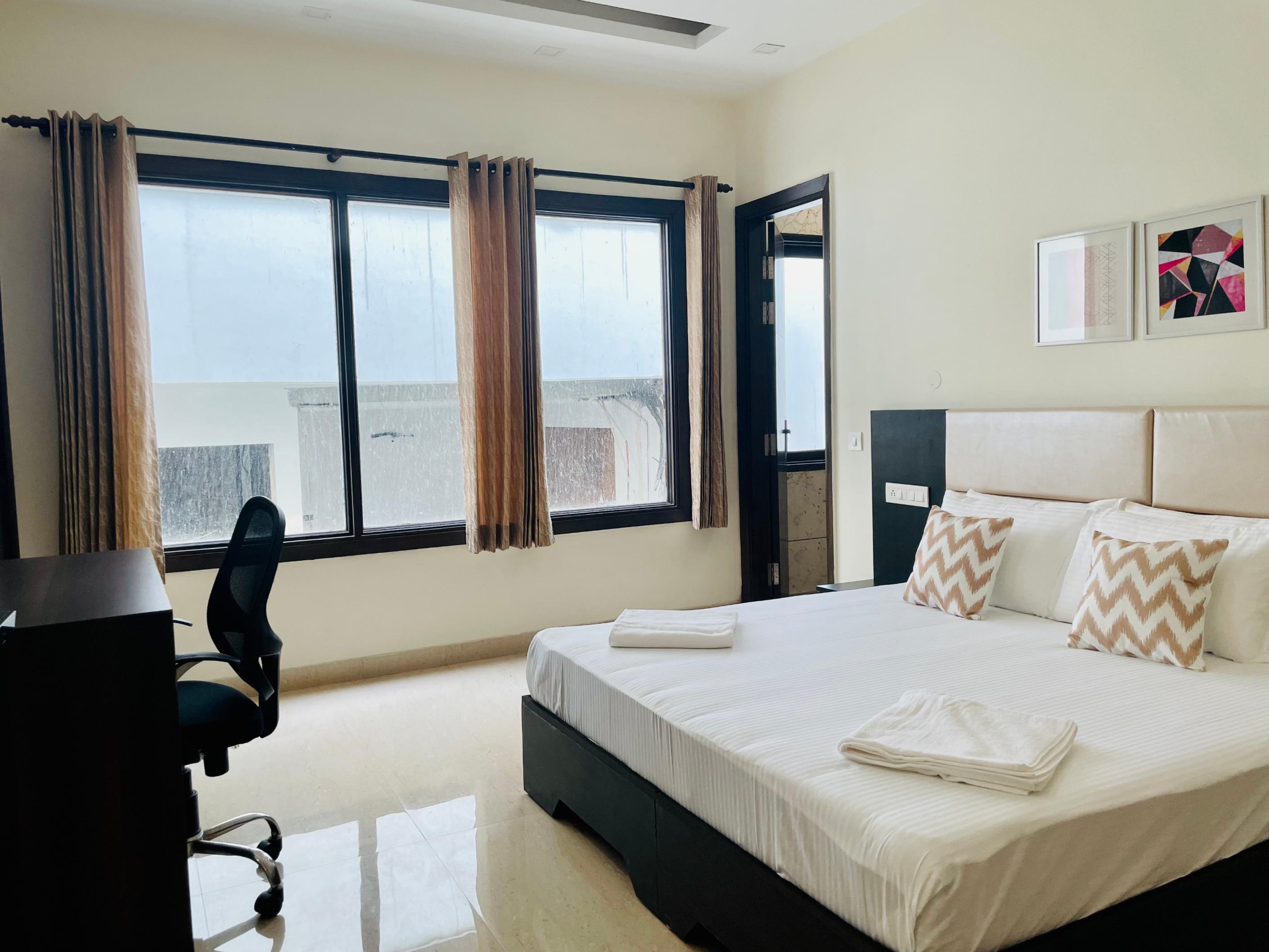 Entire 2BHK Apartment by Bluo at Cyber City - Tap to explore photos