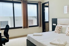 Entire 2BHK Apartment by Bluo at Cyber City