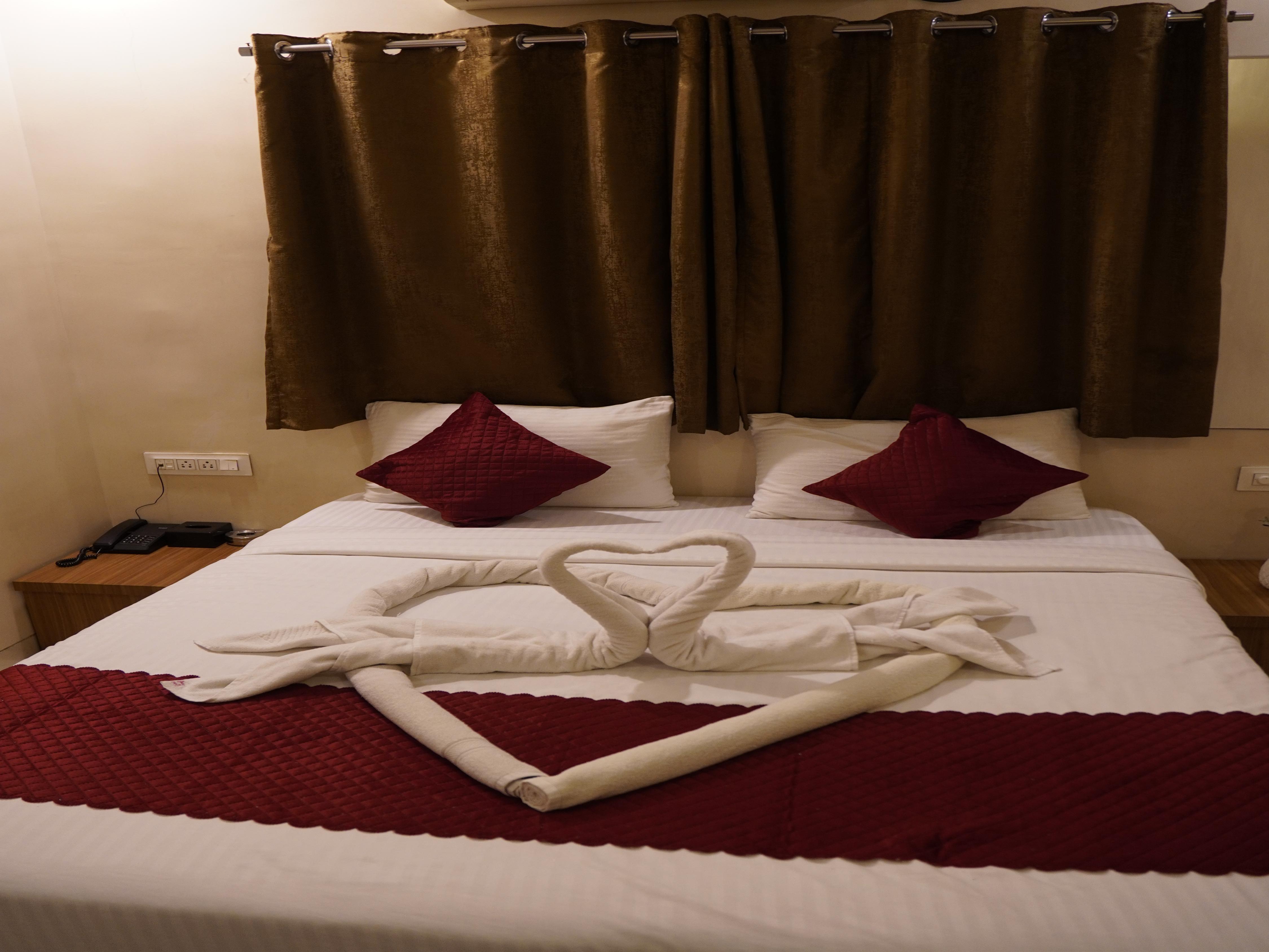 Hotel Trimurti Executive - Tap to explore photos