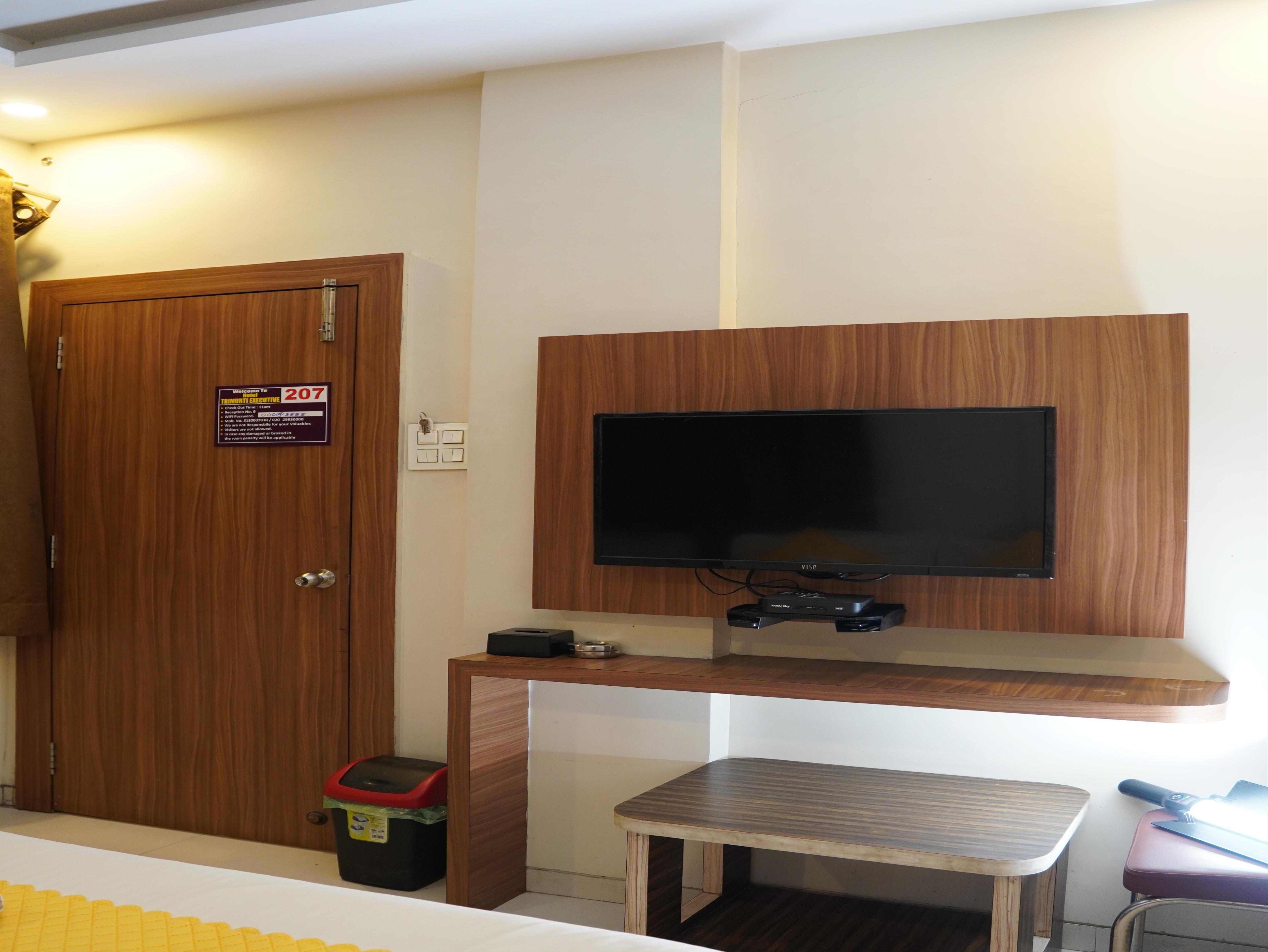 Hotel Trimurti Executive - Tap to explore photos