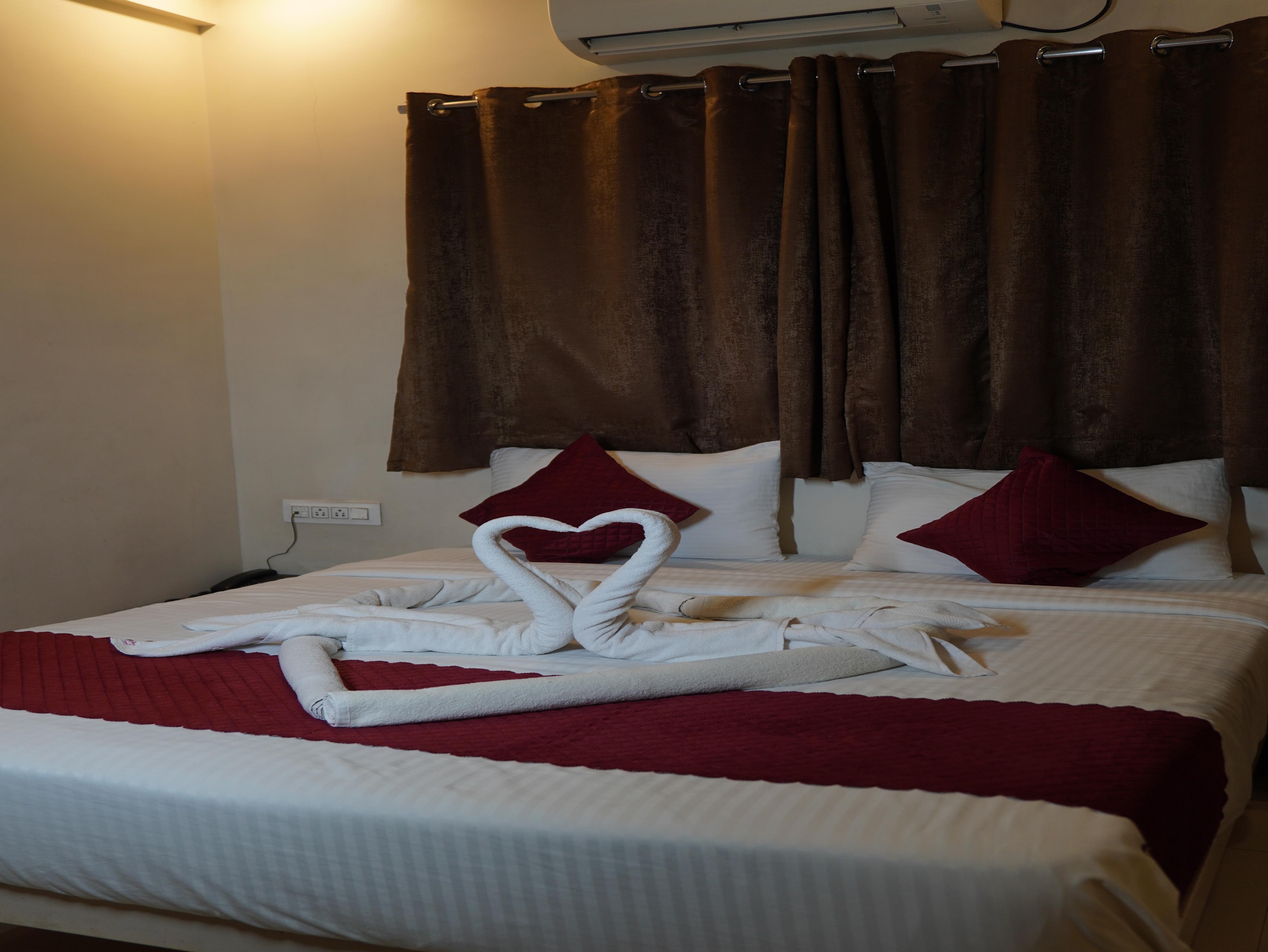 Hotel Trimurti Executive - Tap to explore photos