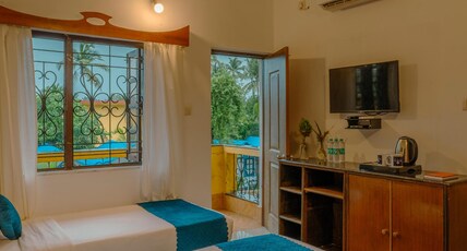 Hibis Resort - Ashwem, Goa Room Type - Deluxe Room with Private Balcony