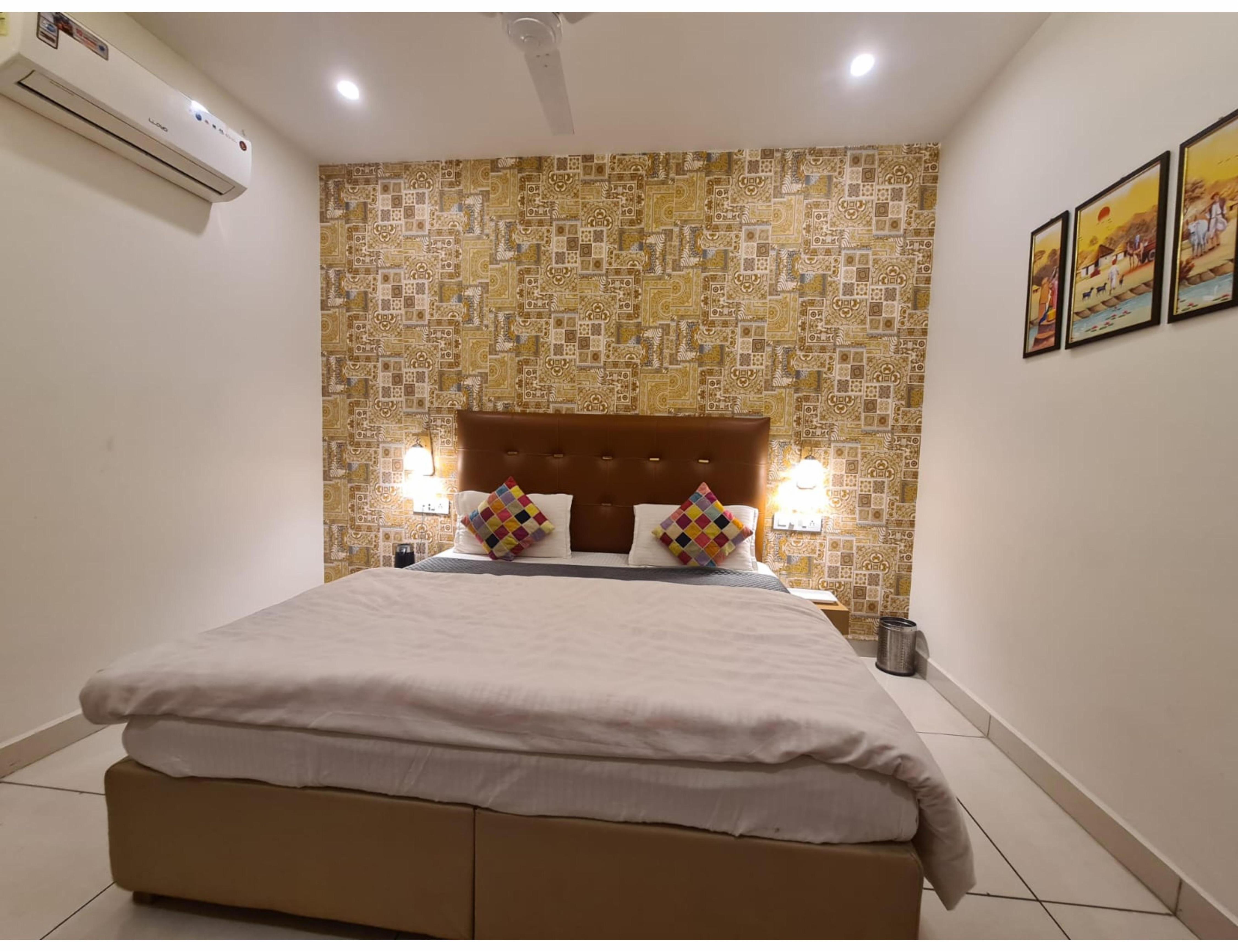 Mahadev Residency | Rooms & Caretaker Room Type - Premium Deluxe Room 1