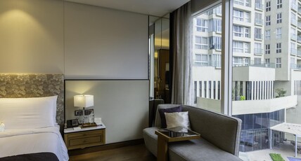 The Leela Bhartiya City Bengaluru Room Type - Pool View King Room