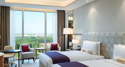 The Leela Bhartiya City Bengaluru Room Type - Royal Club Twin Room with Cocktail Hours The Leela Bhartiya City Bengaluru Room Type - Royal Club Twin Room with Cocktail Hours