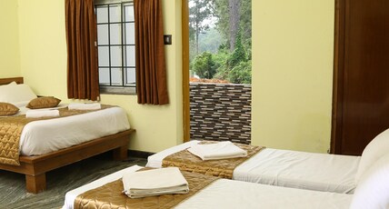 Lotus Resorts & Inn Room Type - Four Bedded Room Lotus Resorts & Inn Room Type - Four Bedded Room