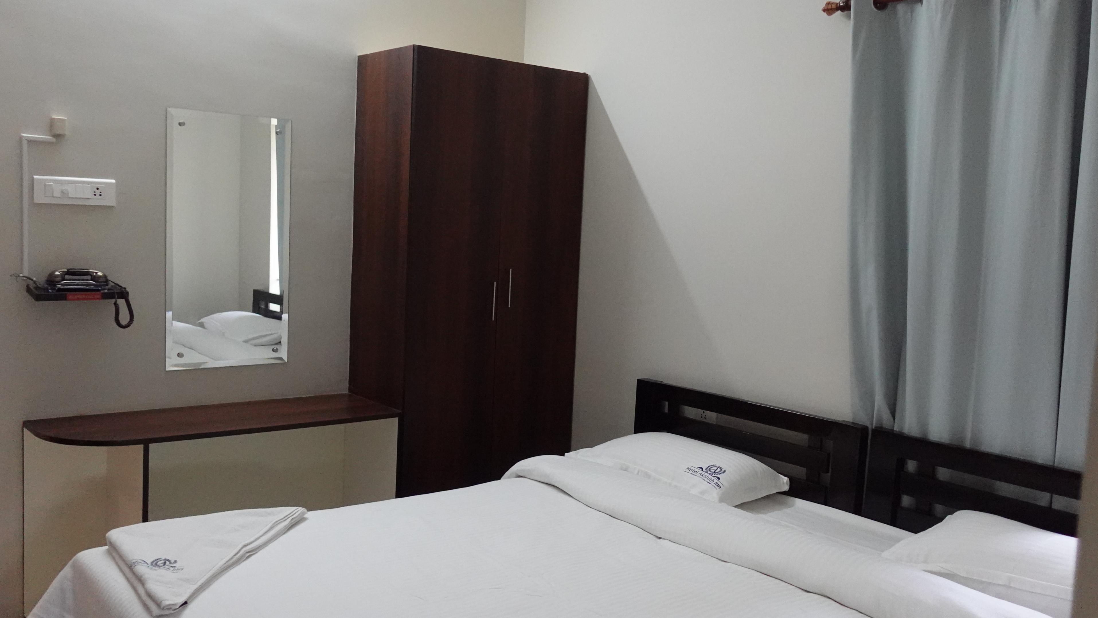 Hotel Akshith Inn - Tap to explore photos