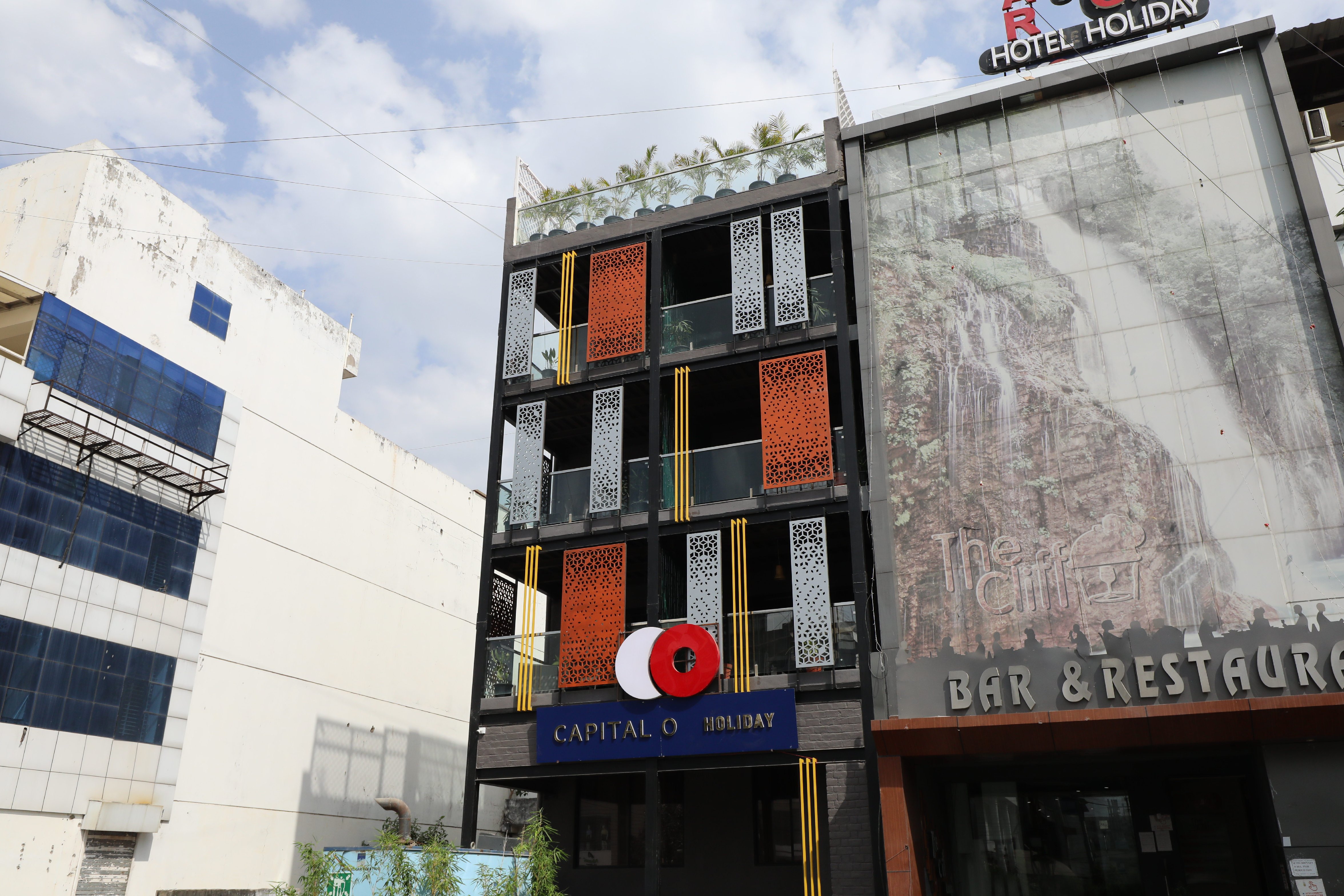 Hotel Holiday Indore - Tap to explore photos