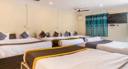 At Home Prakruthi Resorts Room Type - Residence Hall NON AC (10 Adults) At Home Prakruthi Resorts Room Type - Residence Hall NON AC (10 Adults)