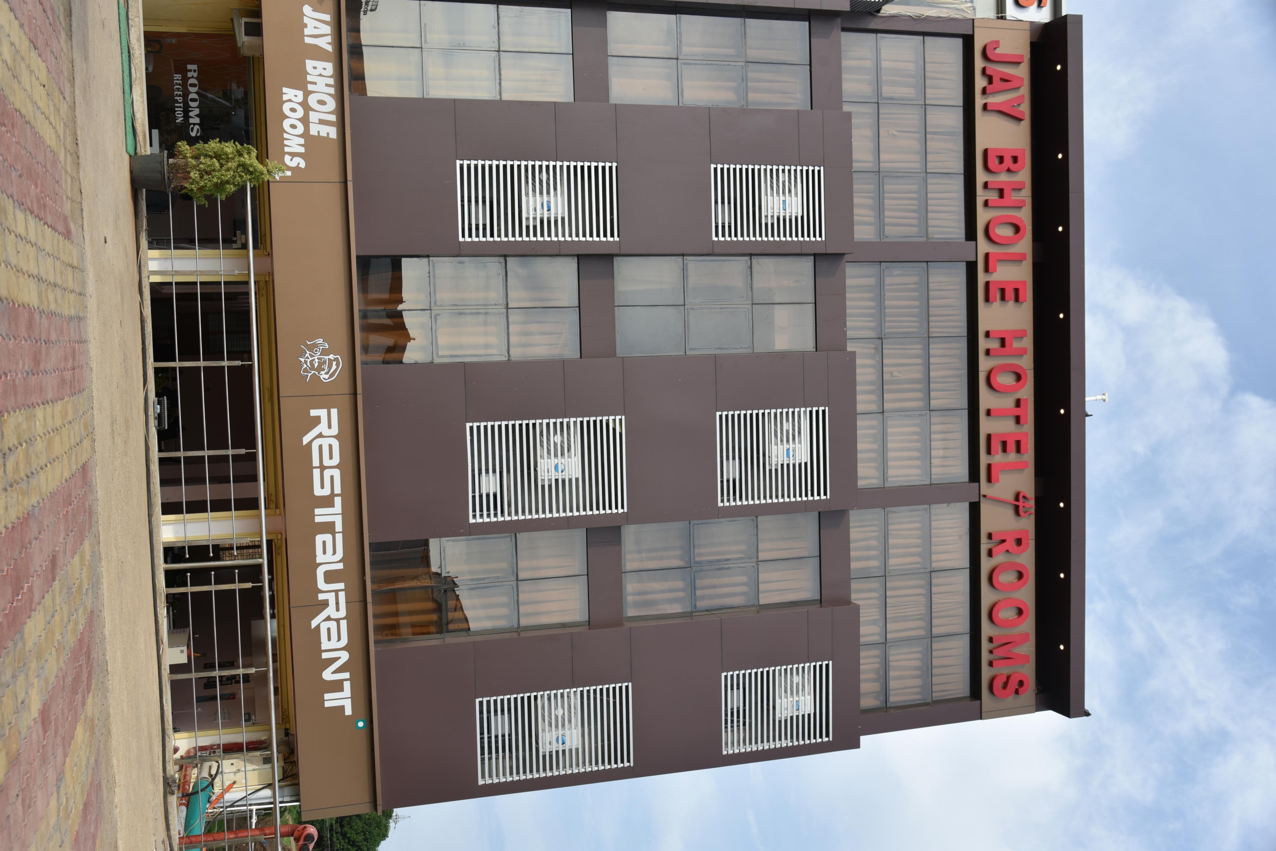 Jay Bhole Hotel And Rooms - Tap to explore photos