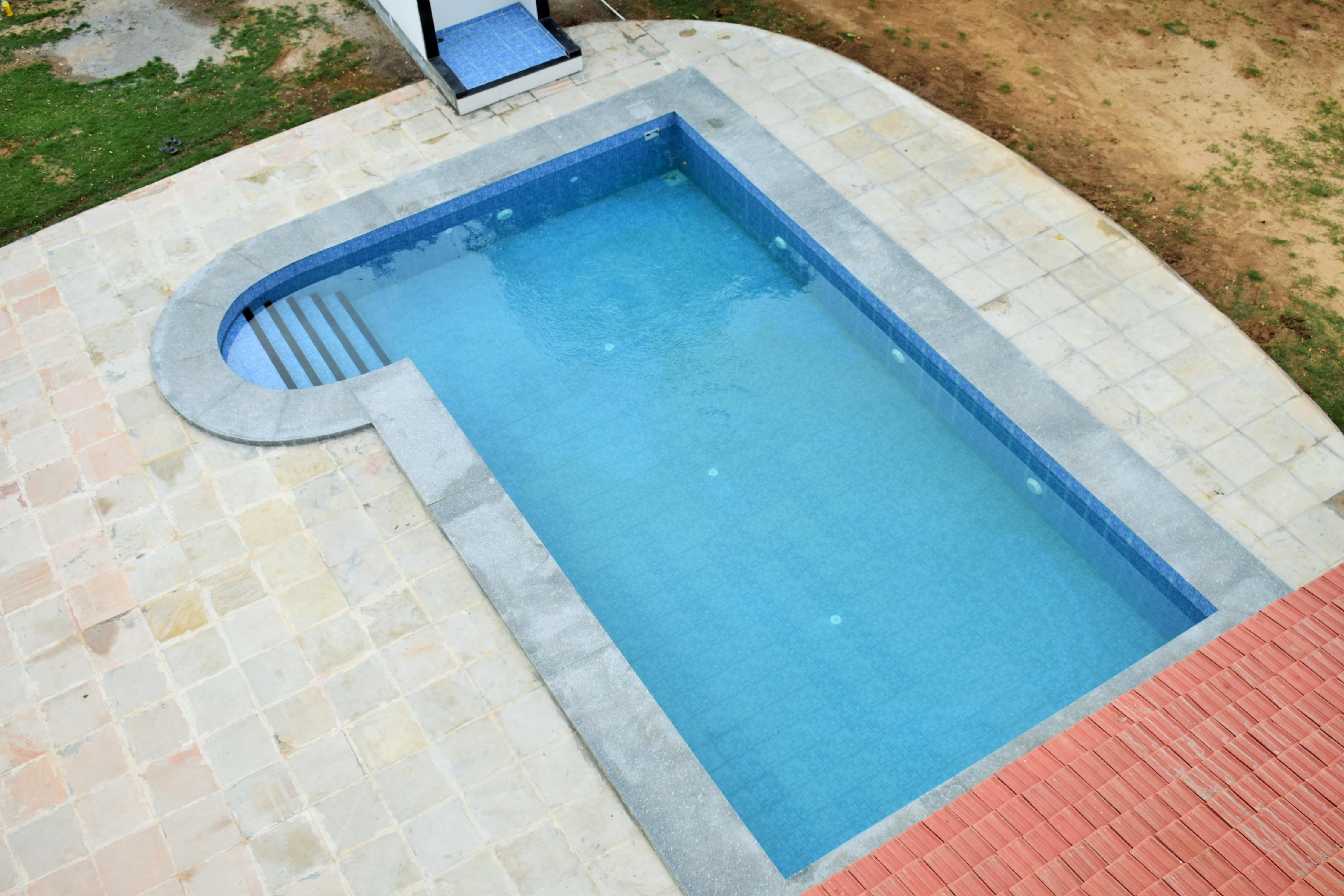 The Golf Retreat | Entire 4BHK Pool Farmhouse - Tap to explore photos