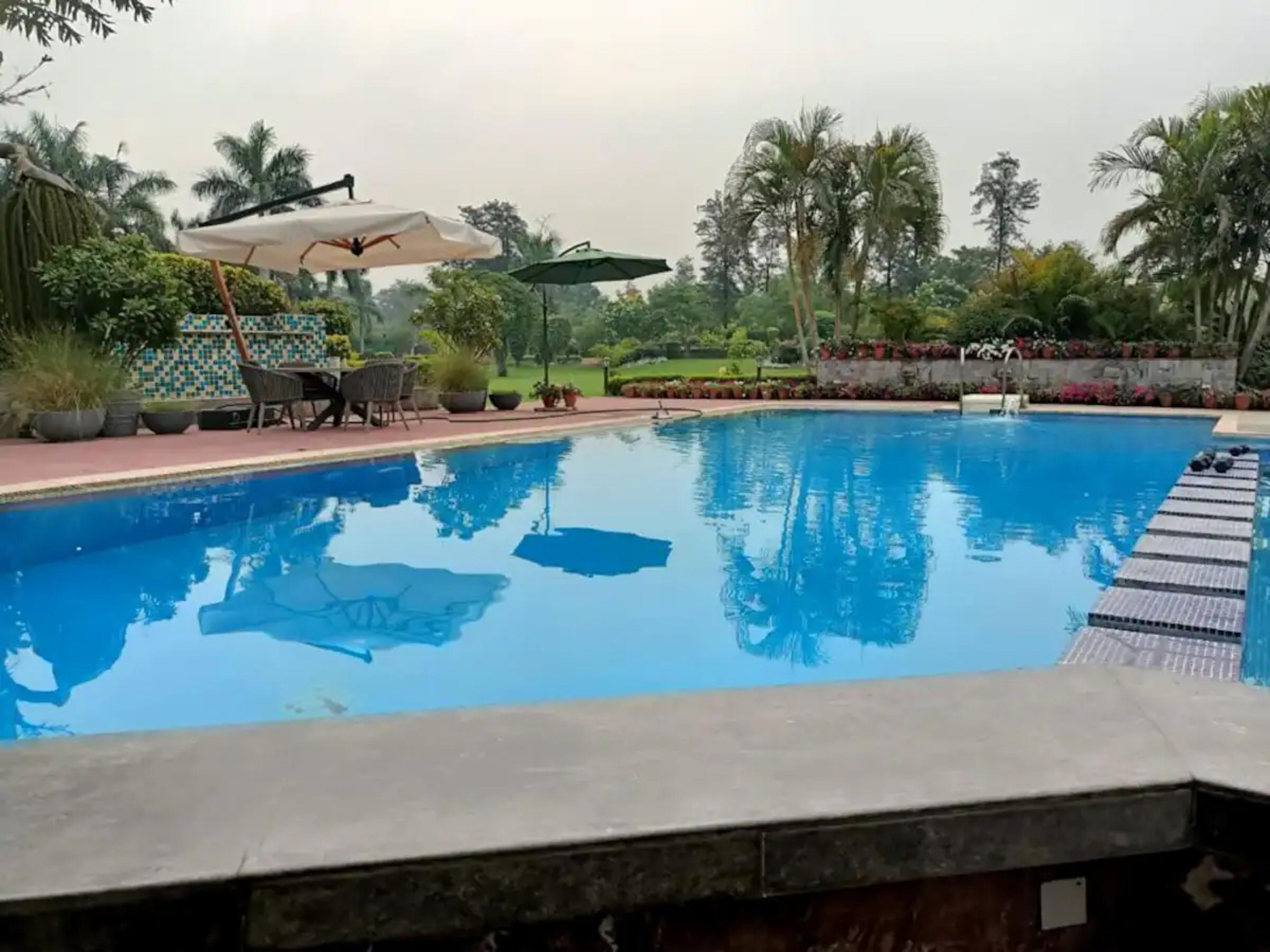 Dimple Villa Paradiso | Swimming Pool with 3 BHK - Tap to explore photos