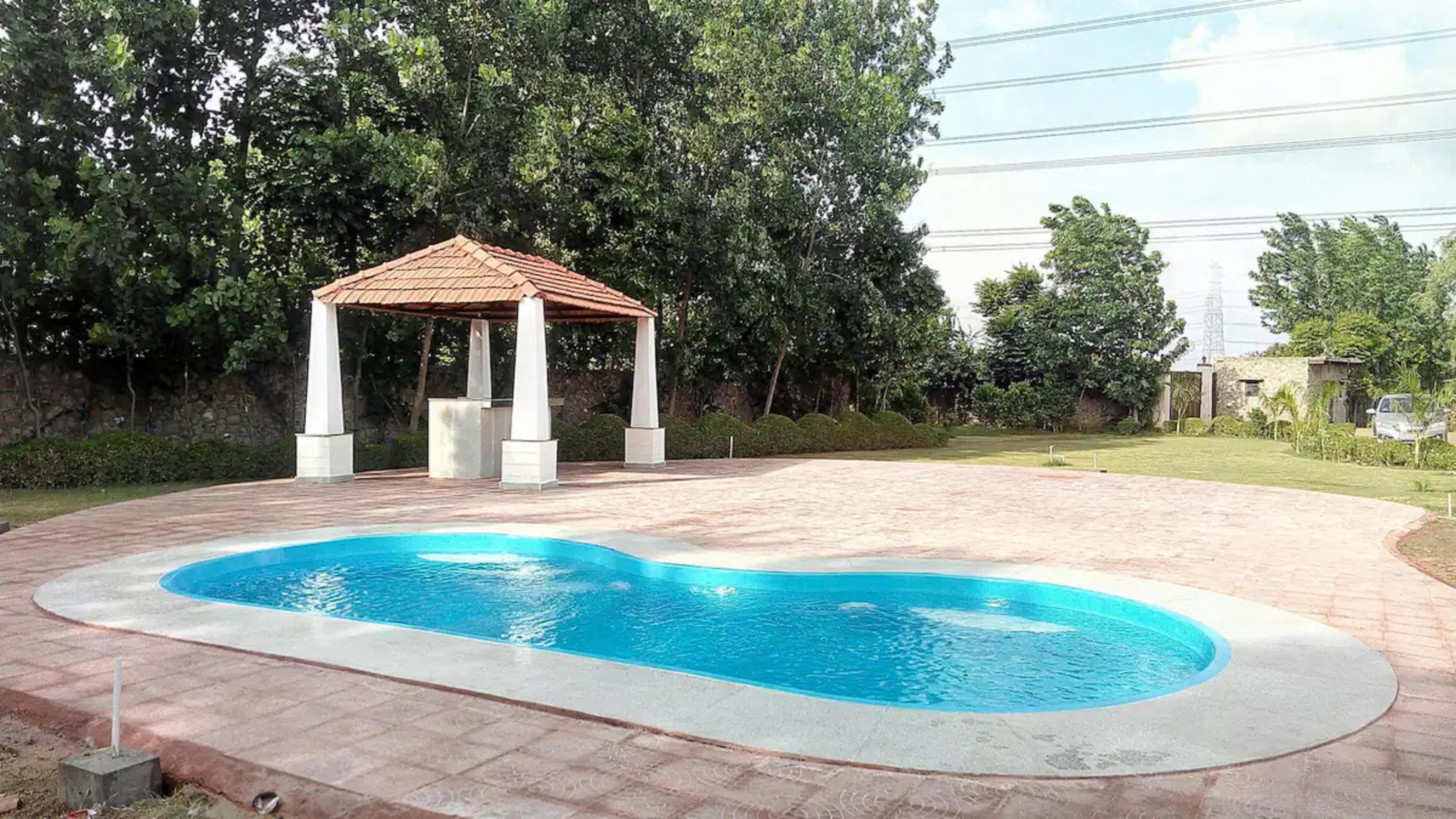 Aranya Greens | Entire 4BHK Pool Farmhouse - Tap to explore photos