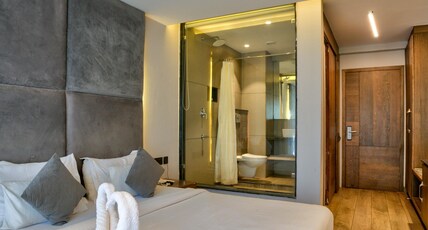 PLAZZIN CANDOLIM Room Type - Deluxe Room