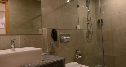 Pushkara Sarovar Portico Room Type - Suite - 1 Double Bed 38SQM Free WiFi Living Area Pushkara Sarovar Portico Room Type - Suite - 1 Double Bed 38SQM Free WiFi Living Area