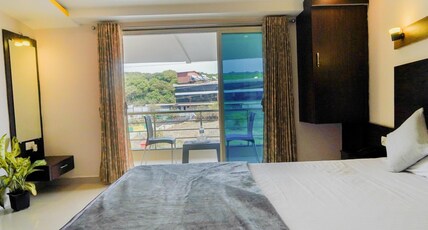 Berry Fresh Stays Mahabaleshwar With Pool Room Type - Deluxe Room with balcony(Upper Floor)