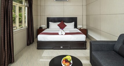 Rainwood Aurum Munnar Room Type - AC Deluxe Room Rainwood Aurum Munnar Room Type - AC Deluxe Room