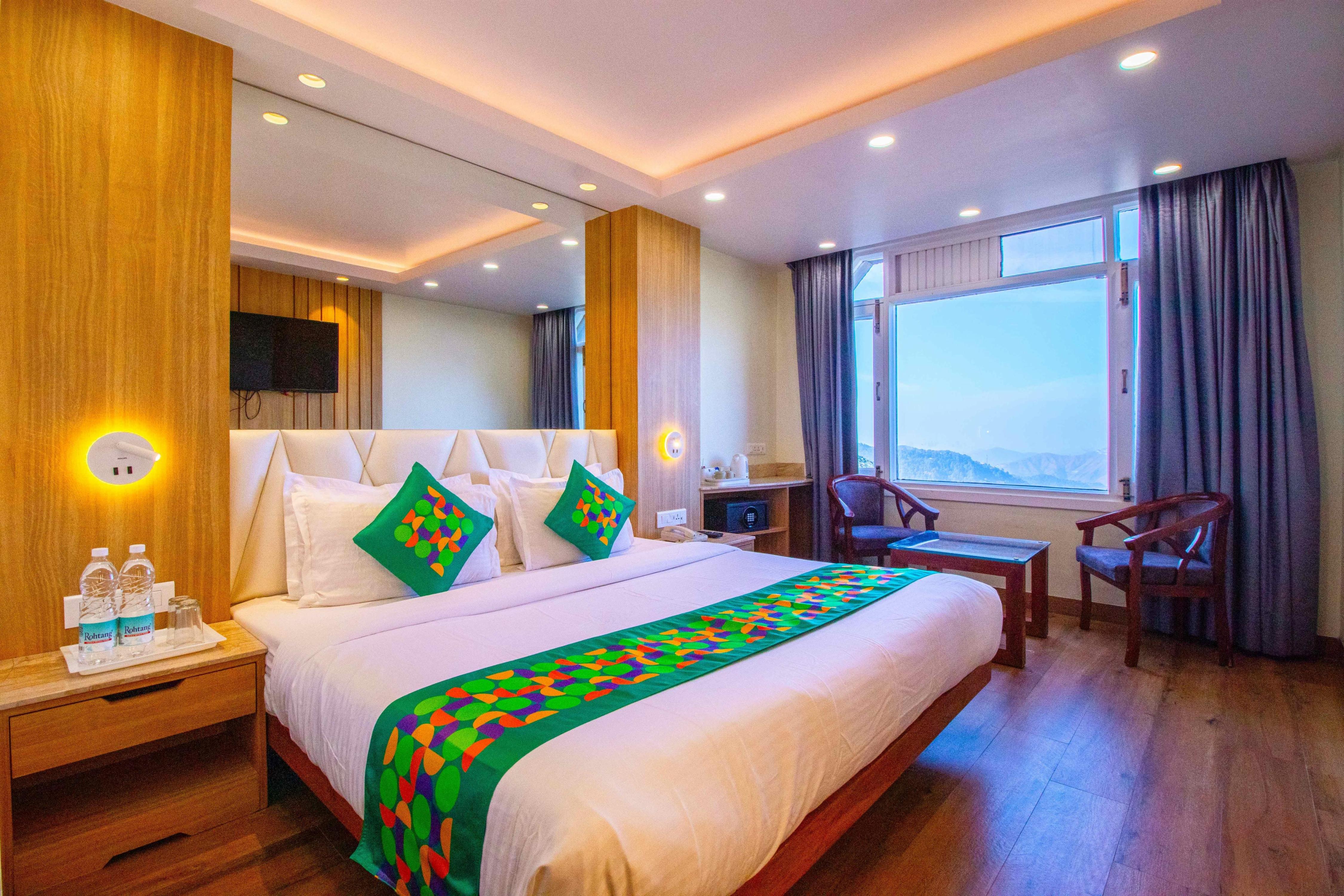 Treebo Varuna With Mountain View, Mall Road Room Type - Deluxe Room with Centralized Heating
