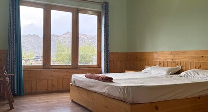 Kushu Guest House | Your Cozy Haven with Personalized Care Room Type - Mountain View Rooms