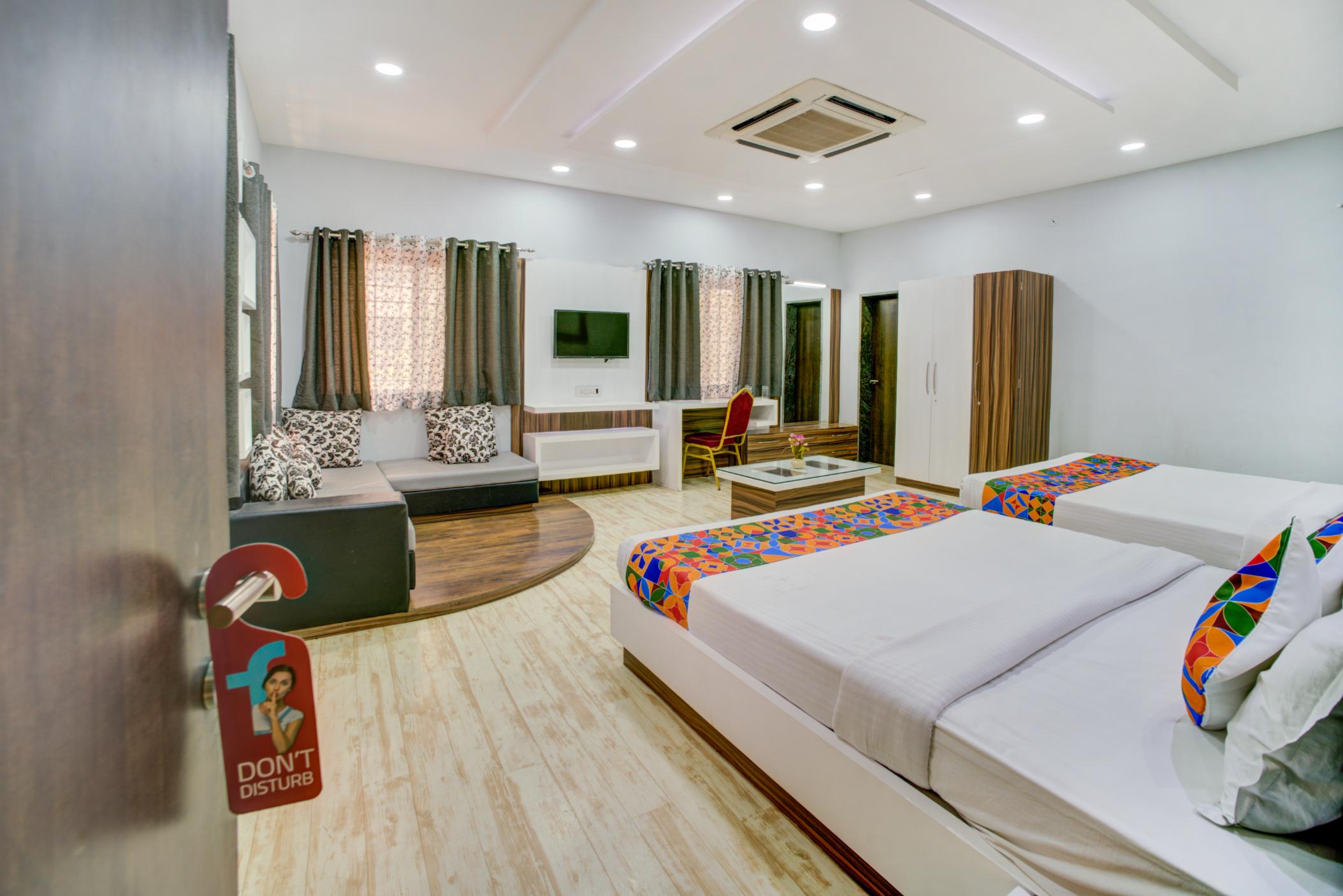 FabHotel Bee Town - AB Road - Tap to explore photos