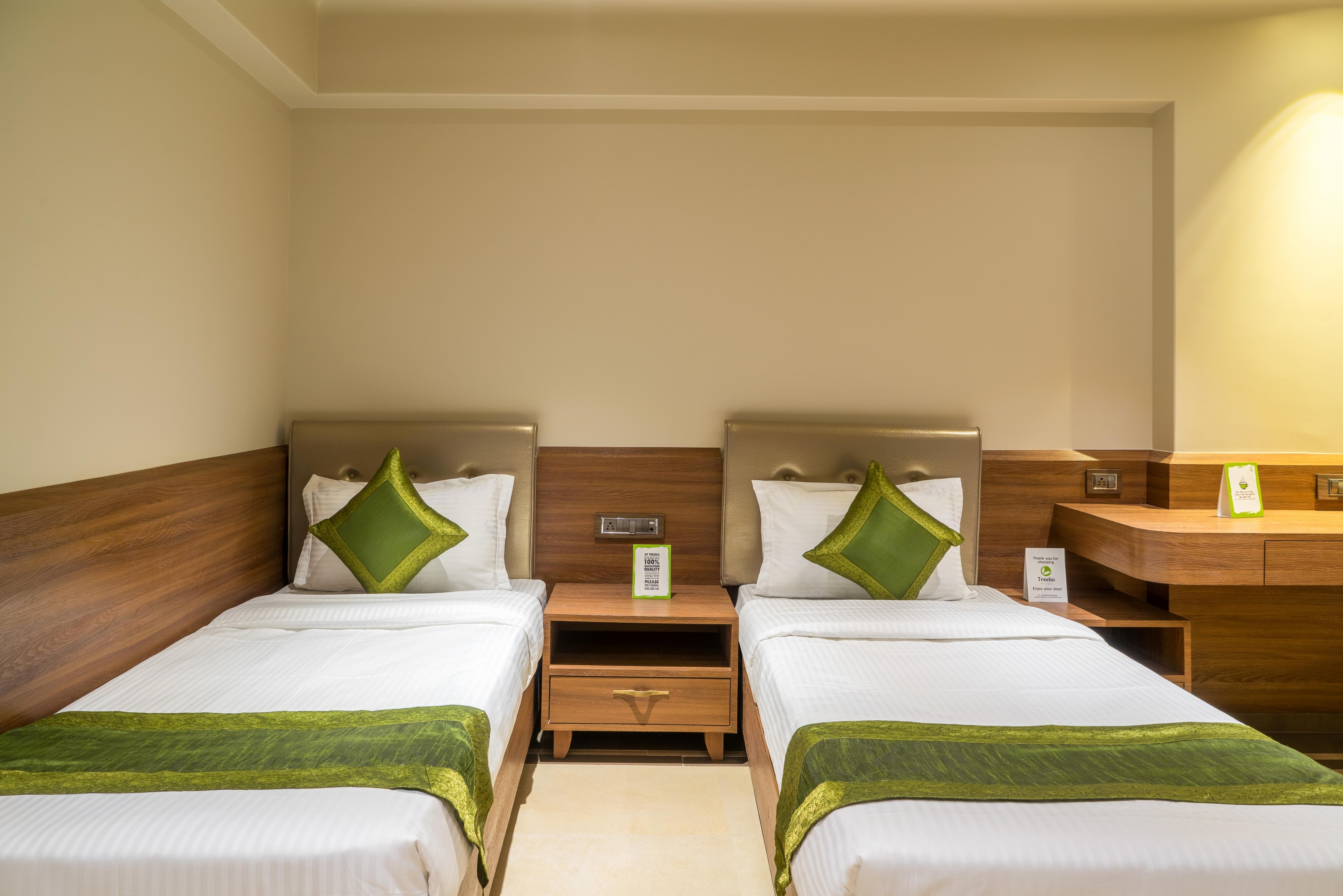 Treebo Olive Nest - Tap to explore photos