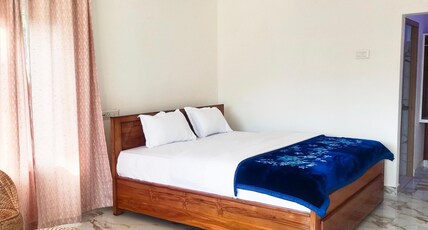Adoroni Guest house Room Type - Deluxe Room
