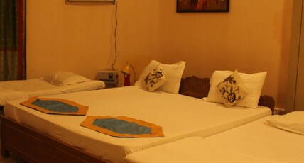 Cozy Inn Homestay | Near Kashi Vishwanath Room Type - Family Room Cozy Inn Homestay | Near Kashi Vishwanath Room Type - Family Room