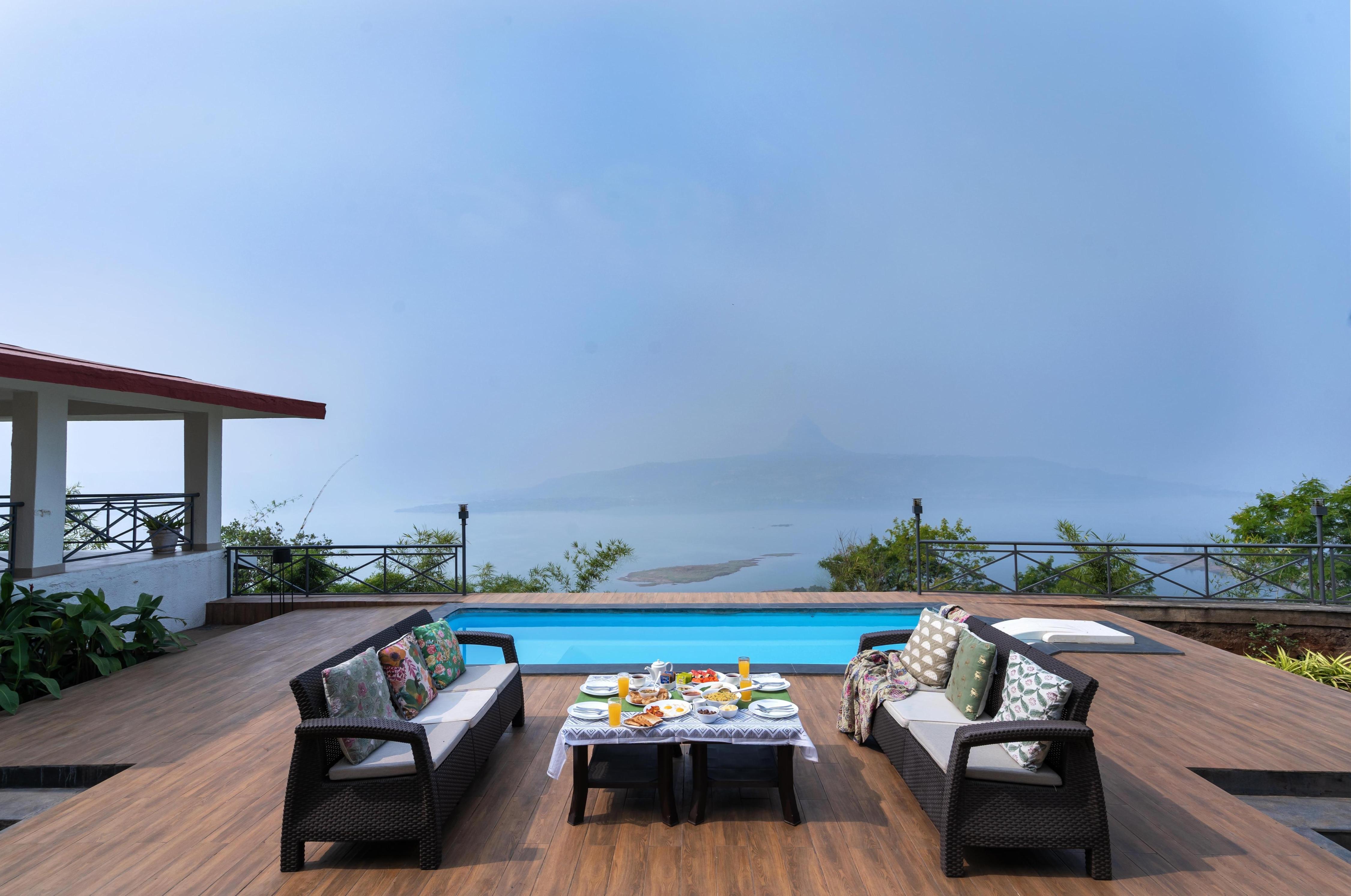 SaffronStays Blue Infinitum Lakeview, Pawna - Tap to explore photos