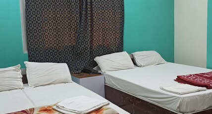 HOTEL MANSAROVAR Room Type - AC Double Beds with Indian Style toilets