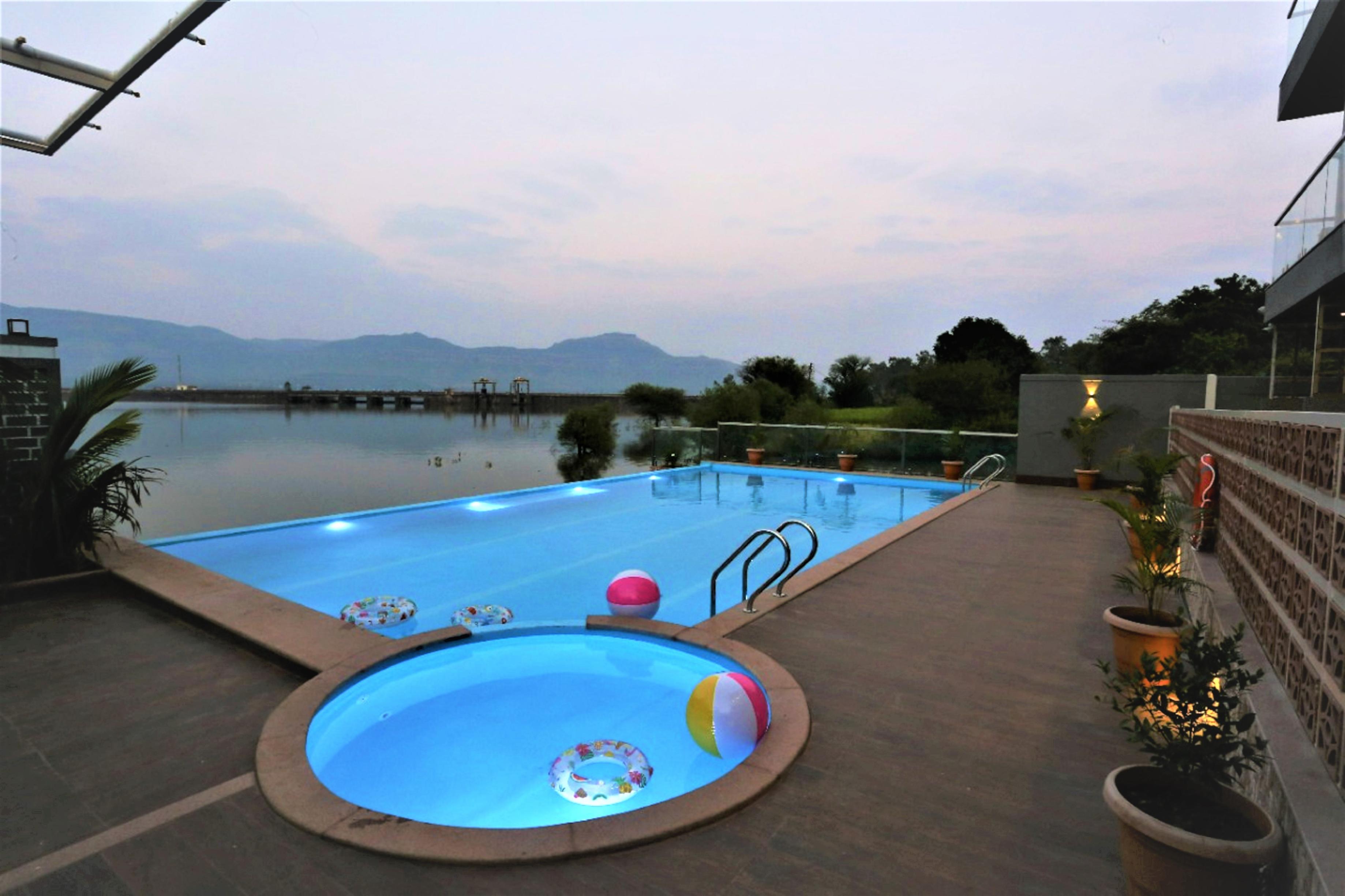 Nakshatra Resort - A Luxury Dam View Dhom Dam - Tap to explore photos