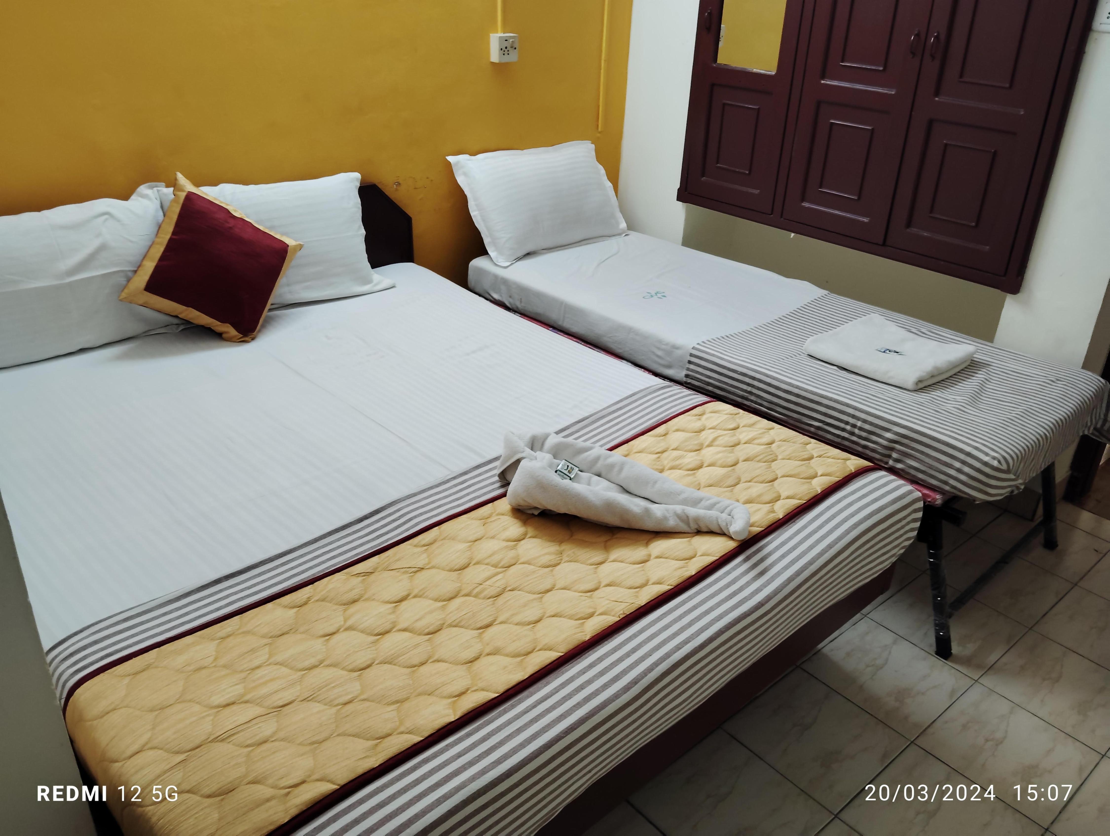 Hotel Gamas Inn Room Type - Basic Trible Non A/C