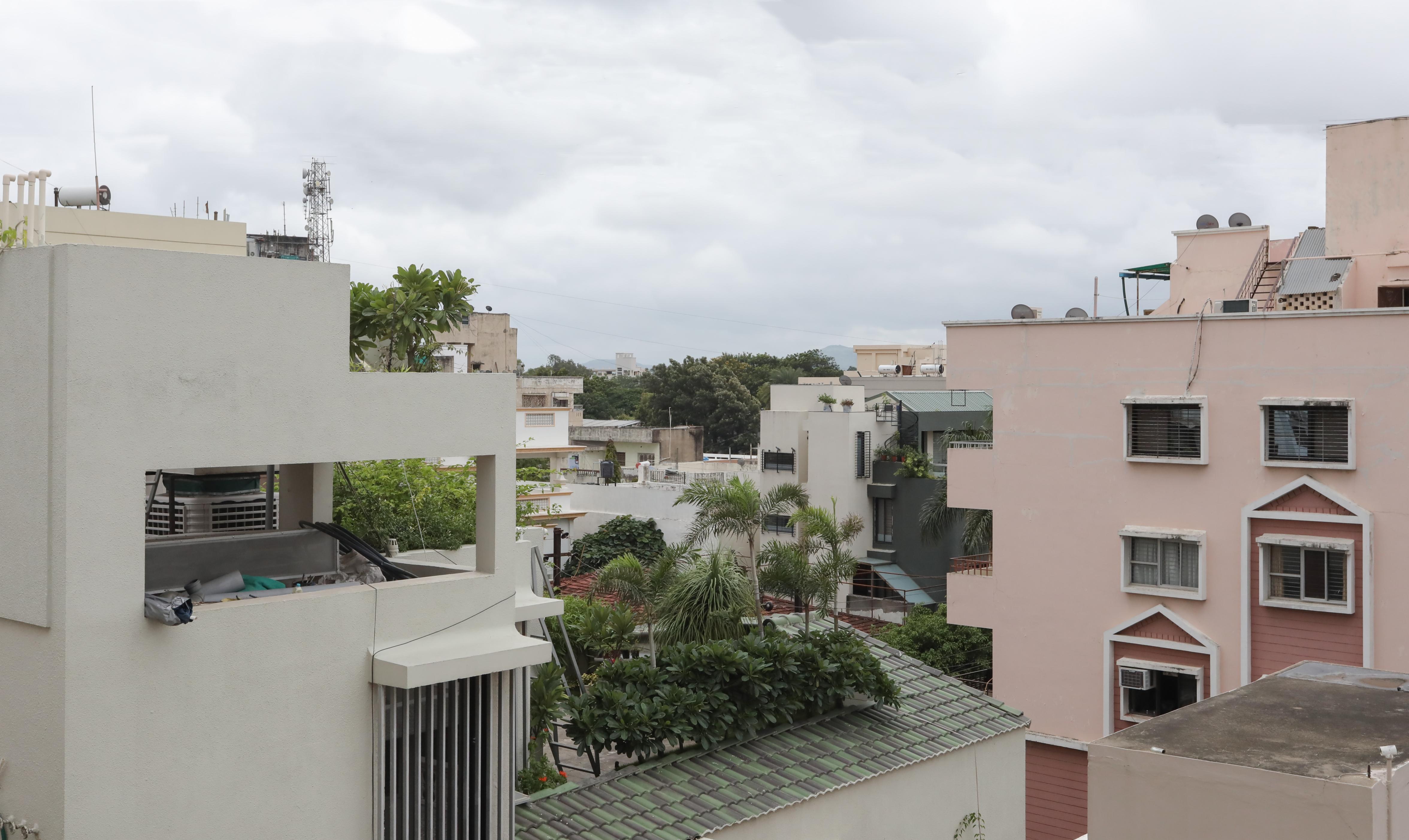 Treebo Omni Palace - Tap to explore photos