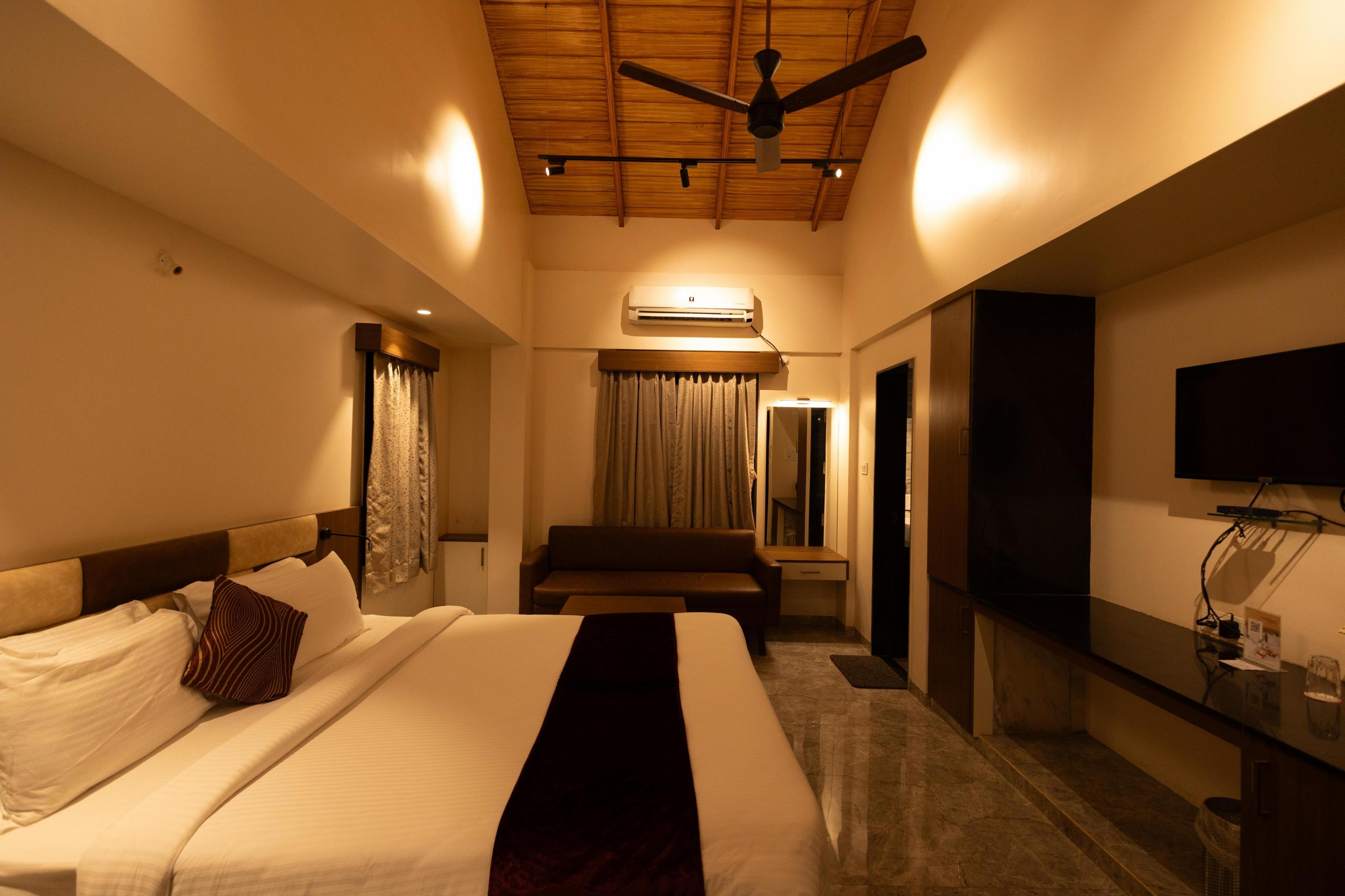 Freesia Resort By Express Inn - Tap to explore photos