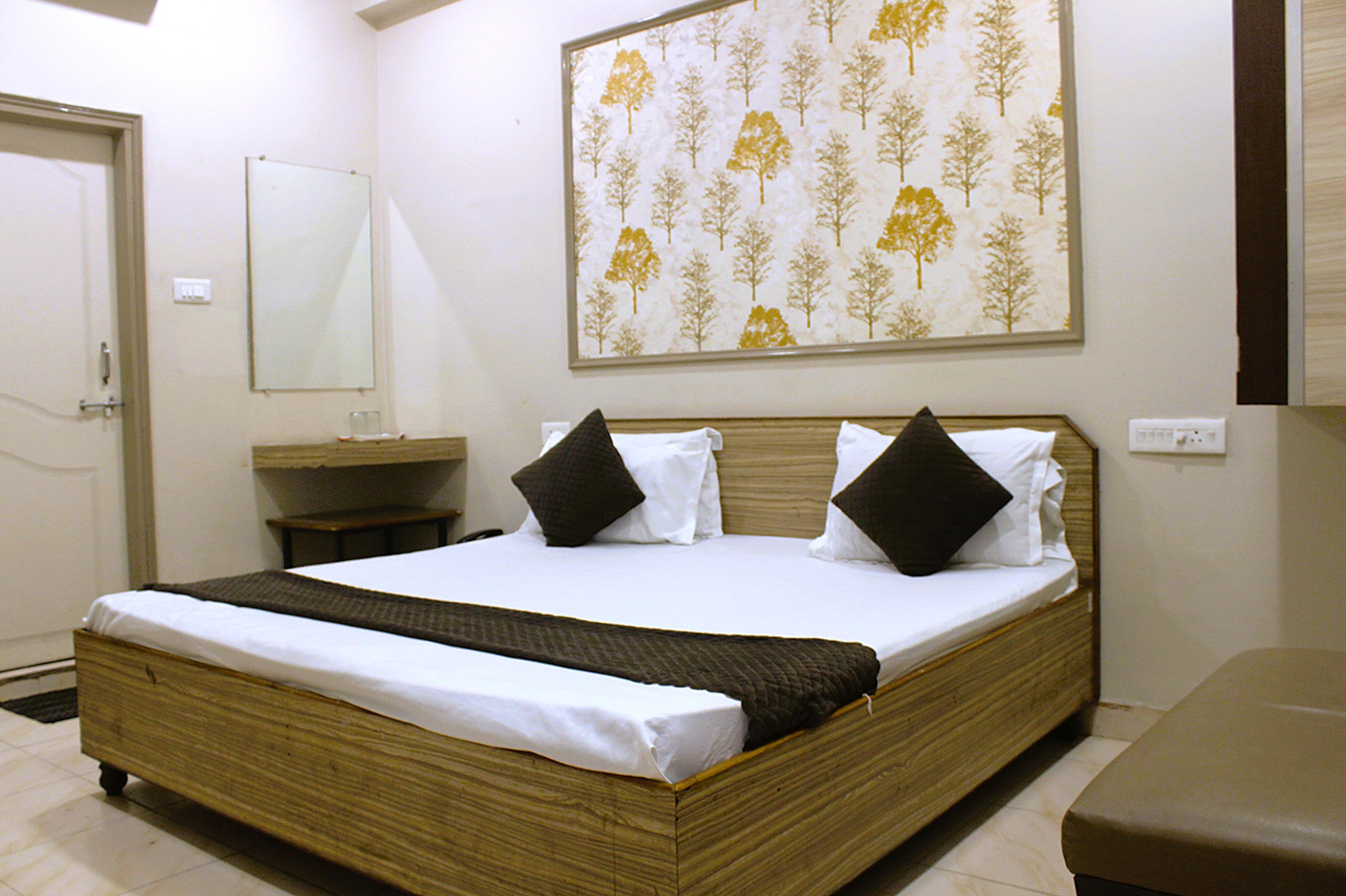 Hotel Midland(Pandri)- Opp. Old Bus Stand Room Type - Deluxe Non AC Room