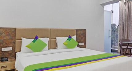 Treebo Kanopy Greens Near Railway Station Room Type - Deluxe Room with Balcony