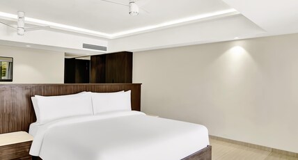 Radisson Resort Goa Baga Room Type - Junior Suite - Pool View Radisson Resort Goa Baga Room Type - Junior Suite - Pool View