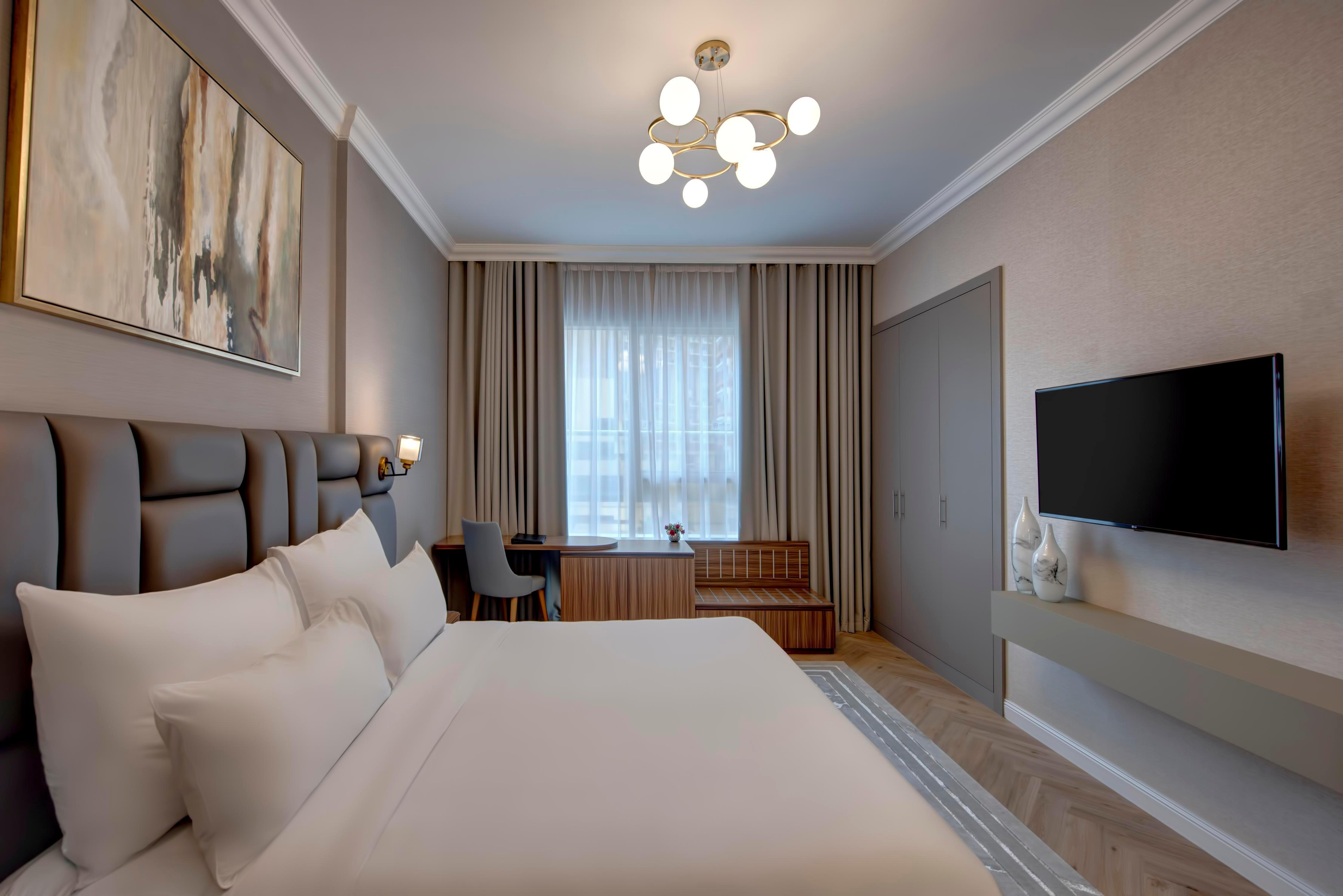 Regency Luxury Suites - Tap to explore photos