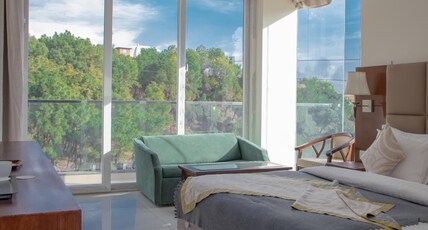 Dharamshala Retreat Room Type - Premium Riverside Room with Mountain and Valley View Dharamshala Retreat Room Type - Premium Riverside Room with Mountain and Valley View