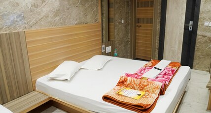 Hotel New Sundaram Room Type - SUPER Deluxe Three Bed AC Room