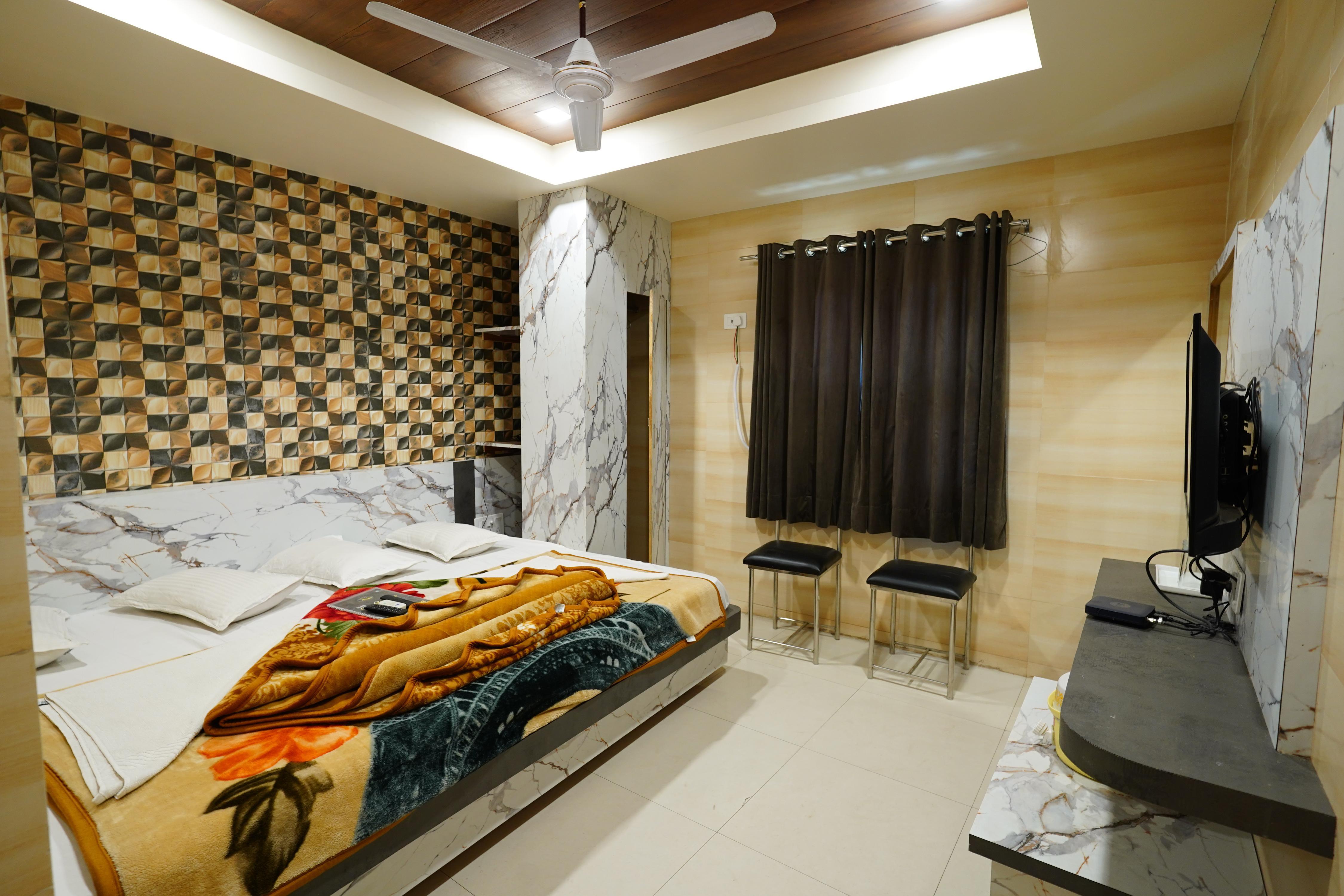 Hotel New Sundaram Room Type - deluxe FOUR bed NON AC  room