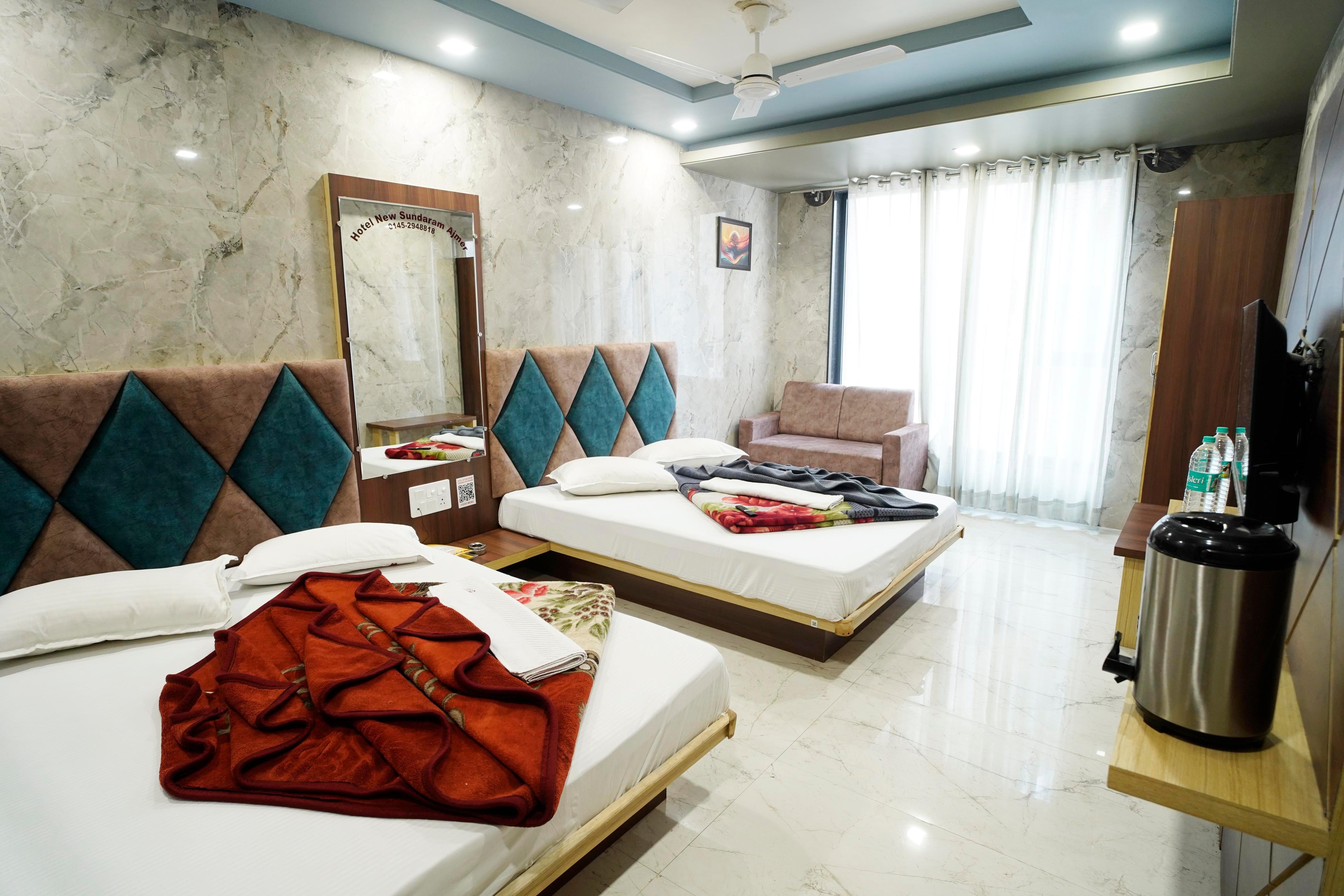 Hotel New Sundaram - Tap to explore photos