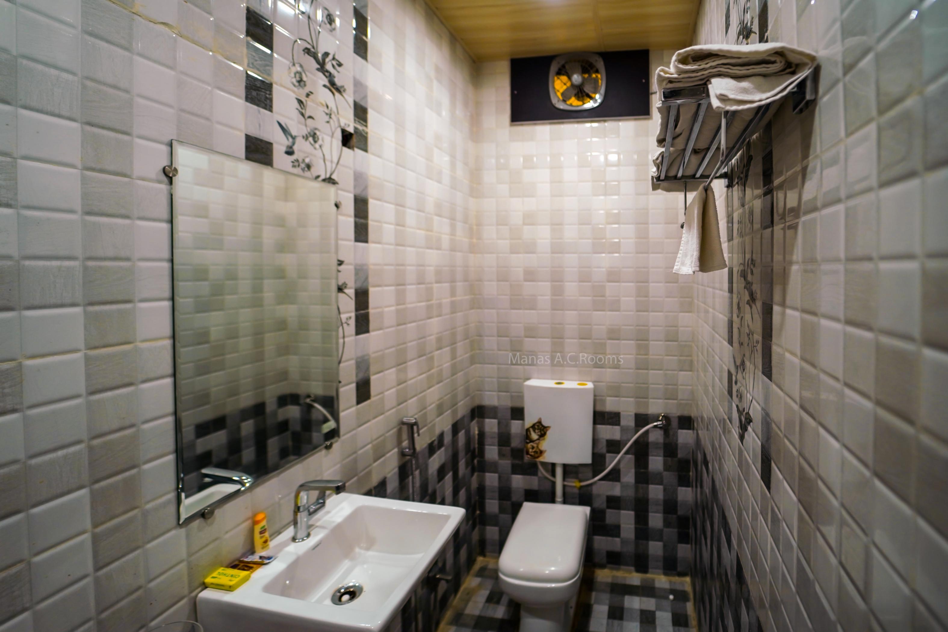 Manas AC Rooms - Tap to explore photos