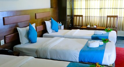 Hotel Kunja Room Type - Deluxe Triple Room