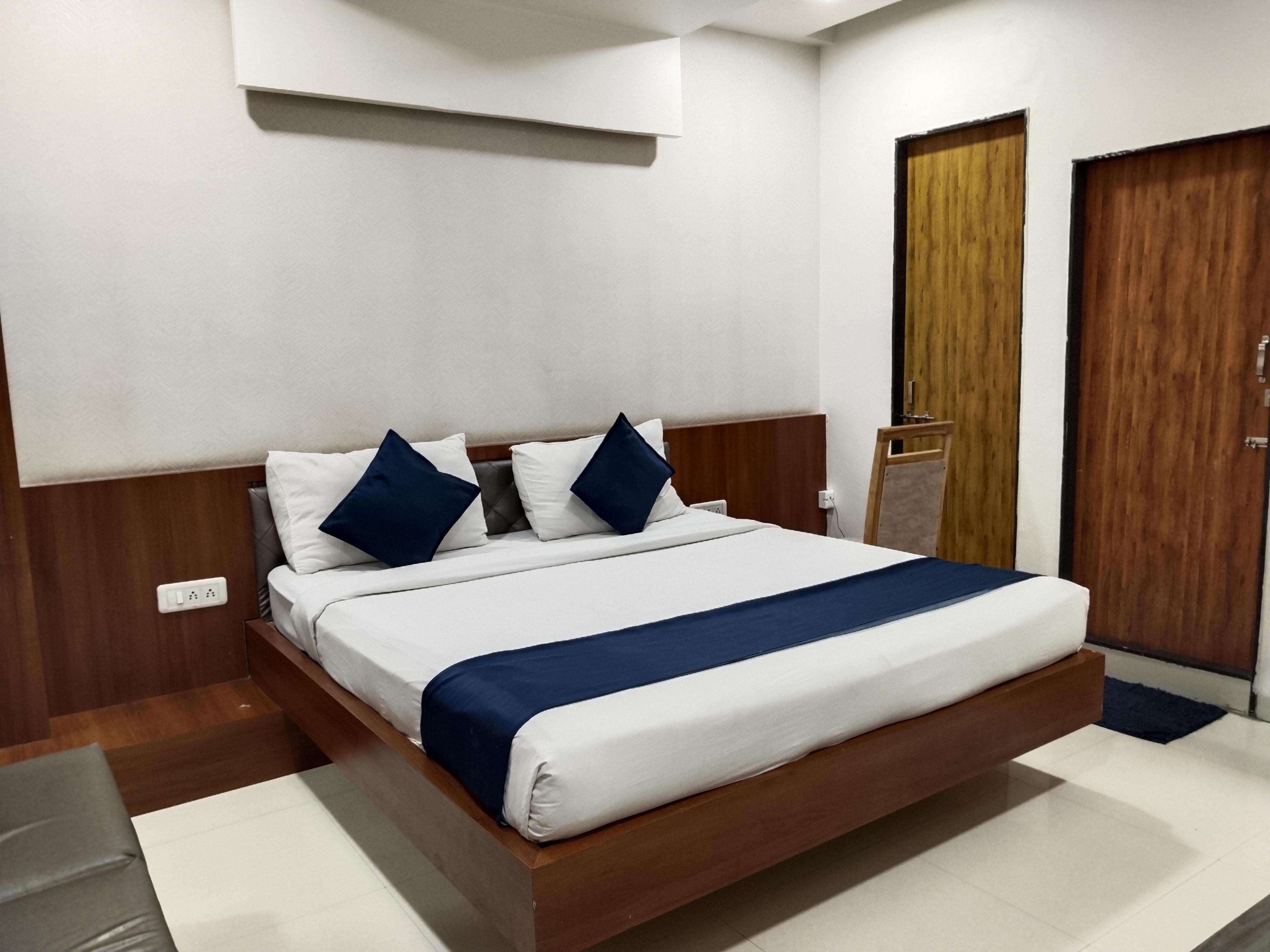 Hotel Ten Eleven Grand, Indore Room Type - Super Deluxe AC Room