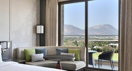 JW Marriott Bengaluru Prestige Golfshire Resort and Spa Room Type - Corner Suite, Executive lounge access, Suite, 1 King, Golf view, Balcony JW Marriott Bengaluru Prestige Golfshire Resort and Spa Room Type - Corner Suite, Executive lounge access, Suite, 1 King, Golf view, Balcony