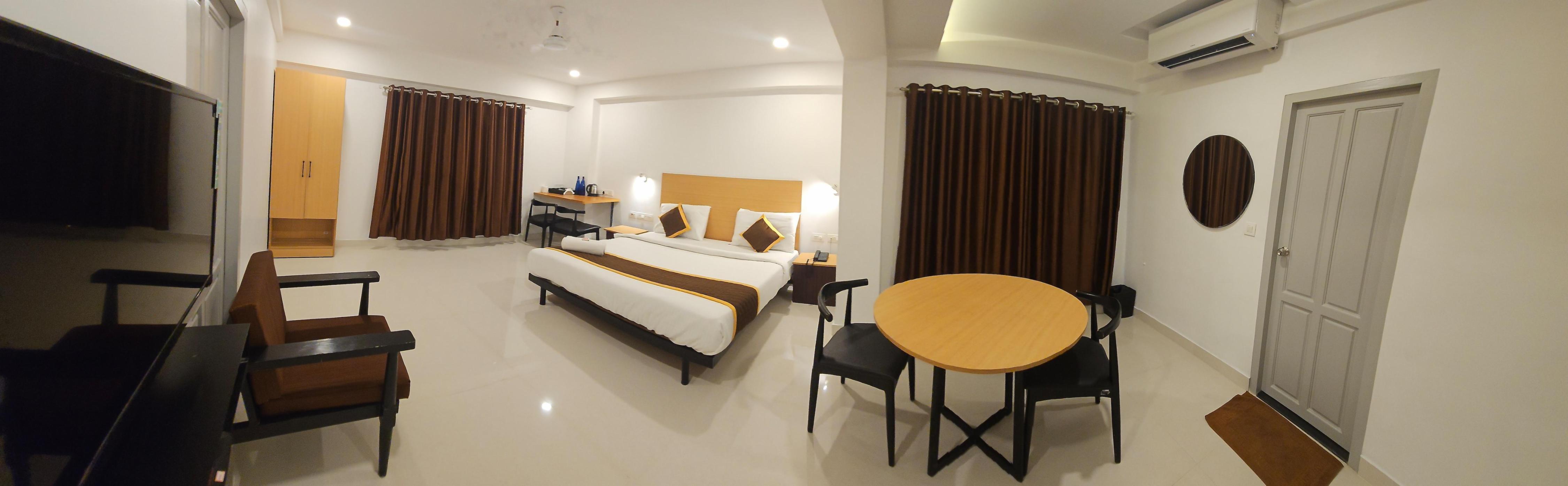 Hotel B R Regency - Tap to explore photos