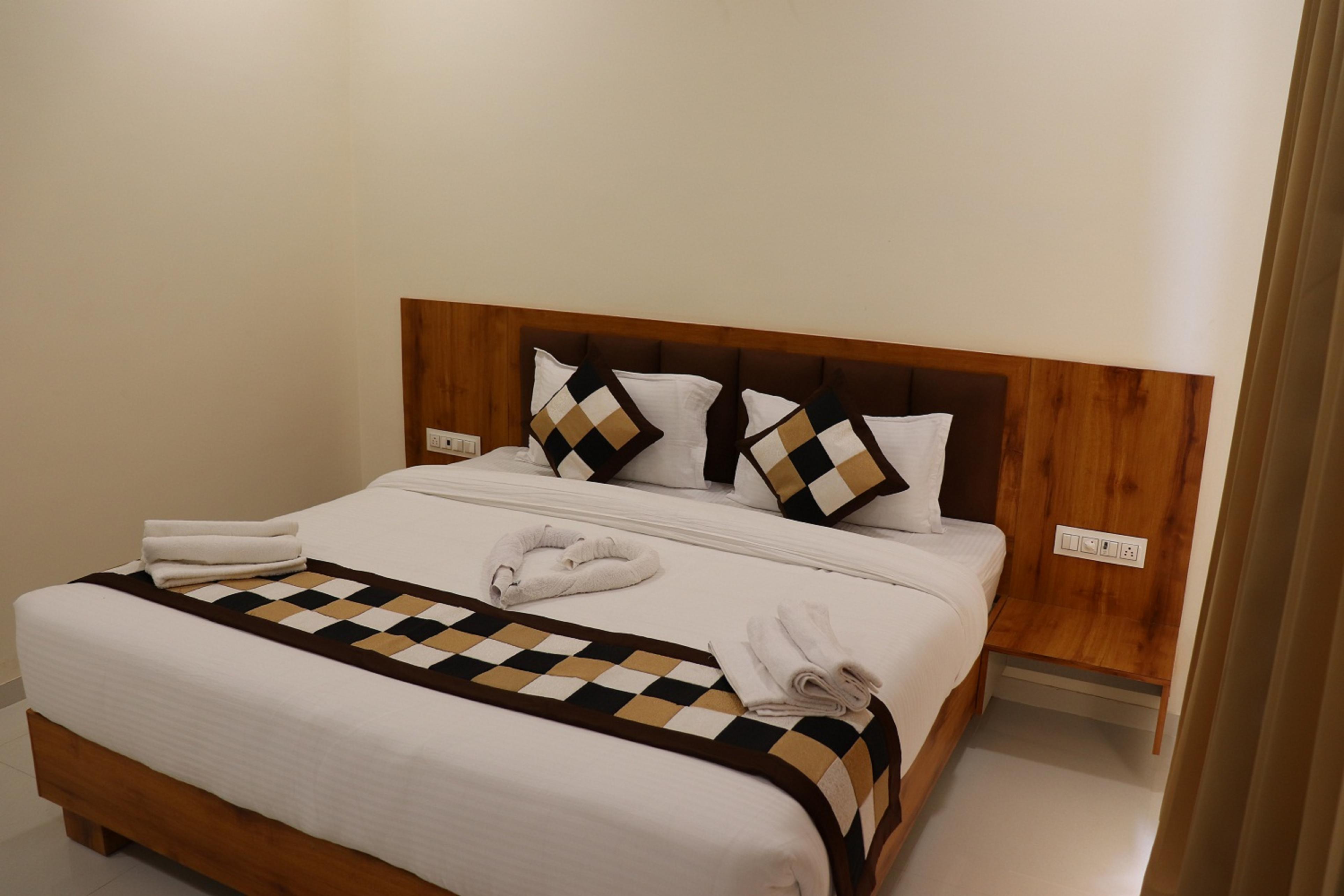 Hotel Natham By Vrinda - Tap to explore photos