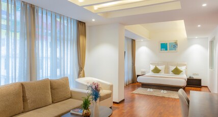 Magpie Libing Grand at MG Marg Room Type - Classic Room Without Balcony