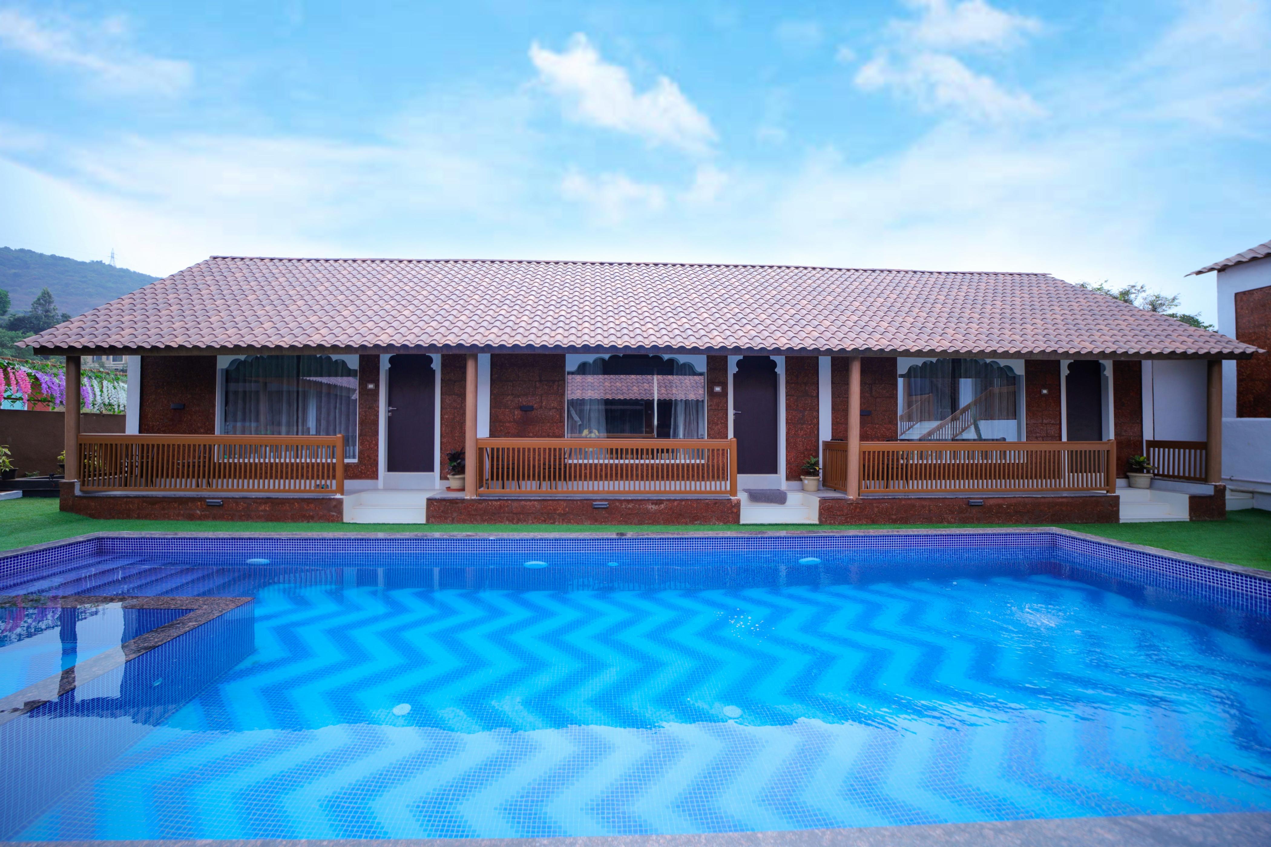 Monarch The Royal Retreat | Rooms & Pool - Tap to explore photos